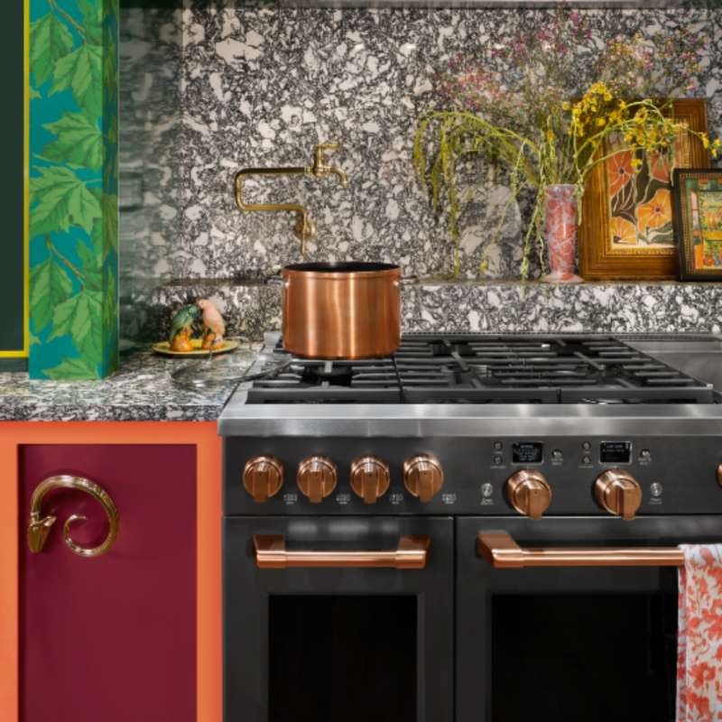 Black and gold GE Cafe range